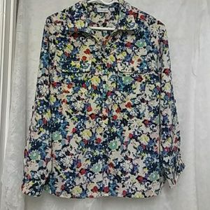 Kim rogers paint and floral print blouse.